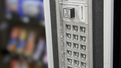 A man used 3628 KG forklift to drag out candy from the vending machine