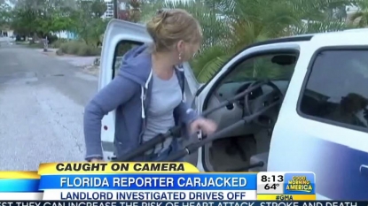 Car of a reporter stolen by an angry woman before live camera