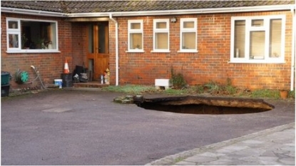 Family ran away after sinkhole swallowed their car