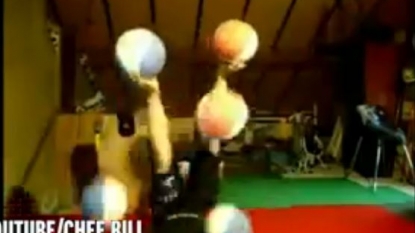 Girl juggling five basketballs at same time using her feet and hands