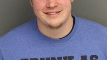 Man arrested for wearing an t-shirt that says “Drunk as shit”