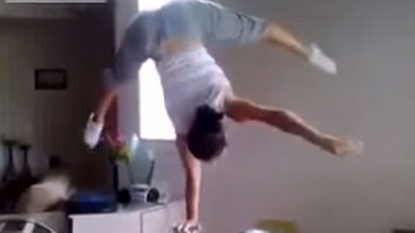 Russian woman showing some extreme performance in kitchen