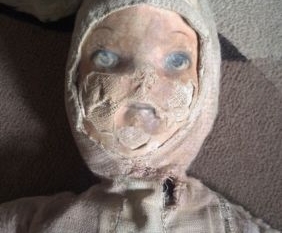 A haunted doll is set for auction on eBay