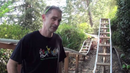 Dad created a roller-coaster at the back of garden for his son