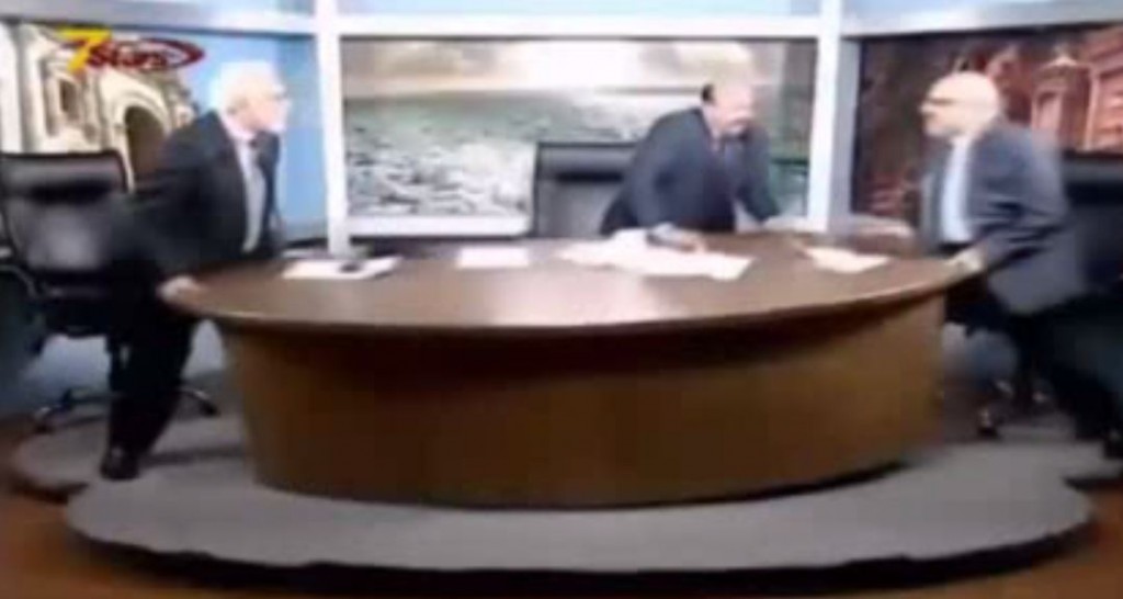 Funny moment when two journalists started fighting live on air