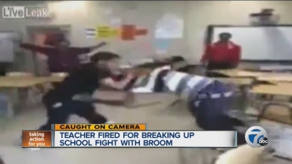 Teacher was fired after using a broom to break up a classroom brawl