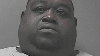 Police found marijuana, cocaine and a handgun hidden under belly fat