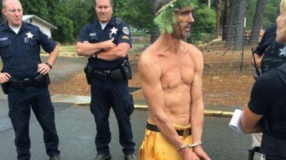 A murder suspect got arrested in yellow loincloth and few green leaves on his head