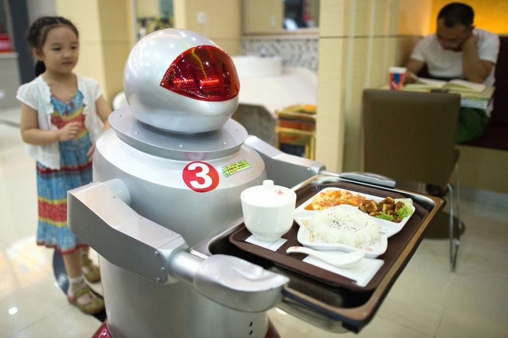 A restaurant where robots are the cook and waiters to serve customers