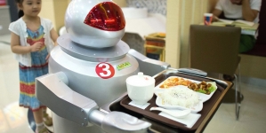 A restaurant where robots are the cook and waiters to serve customers