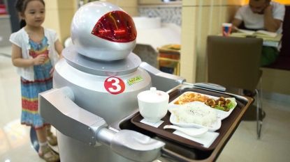 A restaurant where robots are the cook and waiters to serve customers