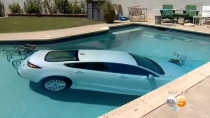 Car submerged into pool after his owner’s footwear got trapped on pedals