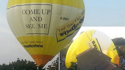 A hot air balloon landed in the residential area after crashing with a house