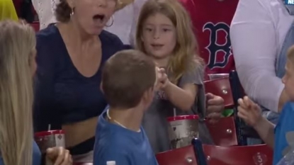 Boy aged 12 amazes everyone by giving the baseball to a girl behind him