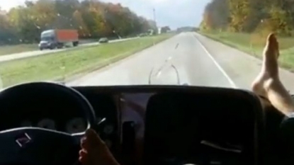 Lorry driver driving the vehicle with only one feet