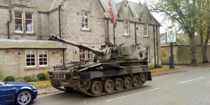 Man went to pub for having a drink in an armed TANK