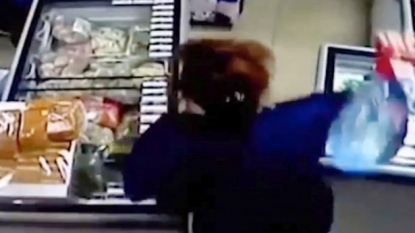 Woman thrown the robbers out of the shop using a water bottle