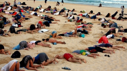 Australians buried their heads into the sand to protest against government