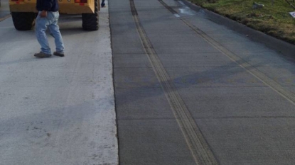 Woman ignored ‘stop’ signals – got stuck into the wet concrete