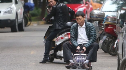 Chinese man has invented the world’s smallest car of length just 23 inch