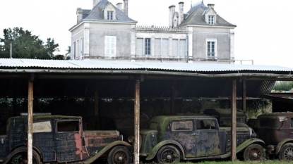 Several rare cars have been found rusting in a French farm shed