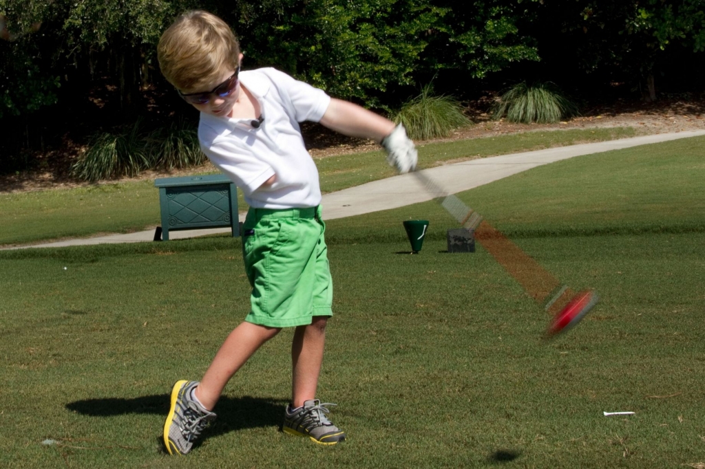 A three year old golfer can drive a ball 100 yards using just one hand