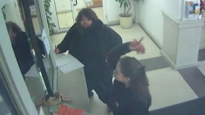 Woman entered into police station and threw raw bacon at officers