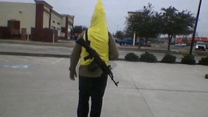 Banana costume man arrested for carrying a rifle