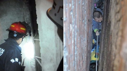 Firefighters rescued the two kid who stuck between the wall