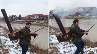 Fisherman carries a stove on his back to fight with the cold during fishing