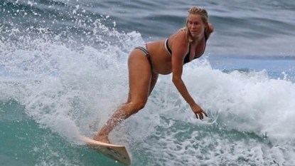 Shark attack victim still surfing in her six month pregnancy