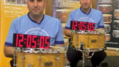 Man rushed hospital after setting longest drum roll world record