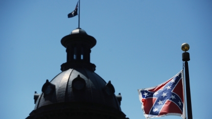 Activist Removes Confederate Flag From Monument | News | BET