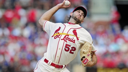 Bourjos scores on throwing error in 10th as Cards beat Cubs