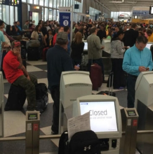 Airlines boost on-time rating but storms create long delays