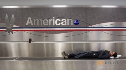 American Airlines lowers plans for U.S. capacity growth