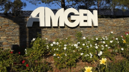 Amgen profit tops Street view, boosts full-year forecast