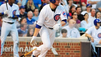 Arrieta, Rizzo lead Cubs over Cards in doubleheader opener