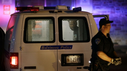 Baltimore police probe transport van sign