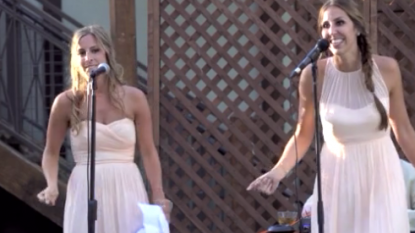 Bridesmaids belt out surprise medley at sister’s wedding