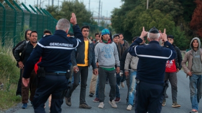 Calais migrant crisis: One night by the fence