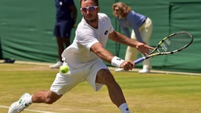 Cilic quickly wraps up win vs Isner at Wimbledon