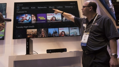 Comcast adds Internet customers; box office pumps up revenue