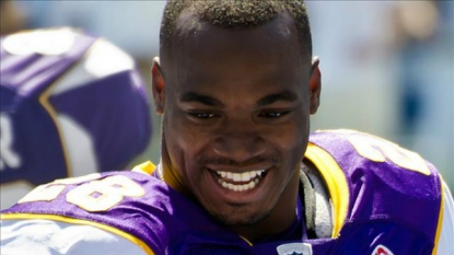 Adrian Peterson and Vikings restructure three-year deal