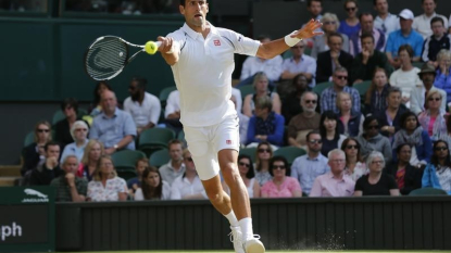 Djokovic glides past Cilic into semi-finals