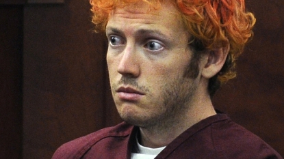 Doctor who found theater shooter insane returns to stand