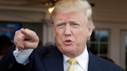 Donald Trump antes up on immigration stance at Libertarian conference in Las