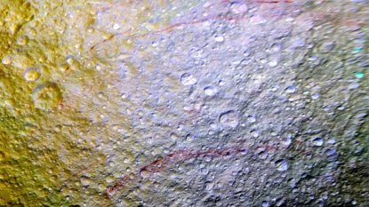 Mysterious Red Arcs Found on Saturn’s Icy Moon Tethys