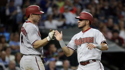 Godley, Peralta lead Diamondbacks to 8-4 victory over Mariners