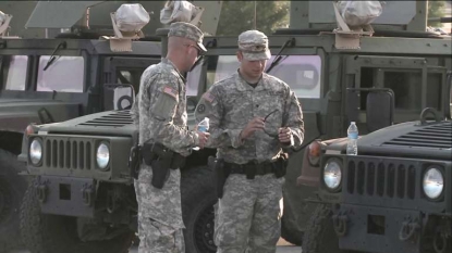 Armed Guardsmen to be stationed at National Guard recruiting cen